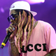 Illustration for article titled It's 3 p.m., let's bear witness to Lil Wayne trying to play guitar